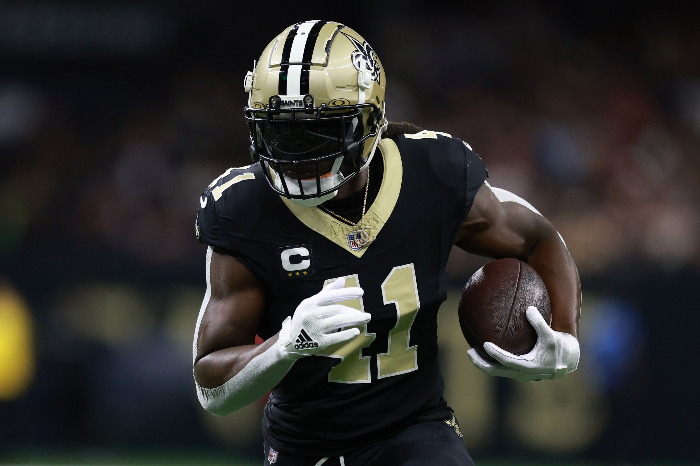 NEW ORLEANS, LOUISIANA - OCTOBER 12: Alvin Kamara #41 of the New Orleans Saints runs with the ball against the New England Patriots during the NFL 2025 game at Caesars Superdome on October 12, 2025 in New Orleans, Louisiana.”” (Photo by Kenneth Richmond/Getty Images)