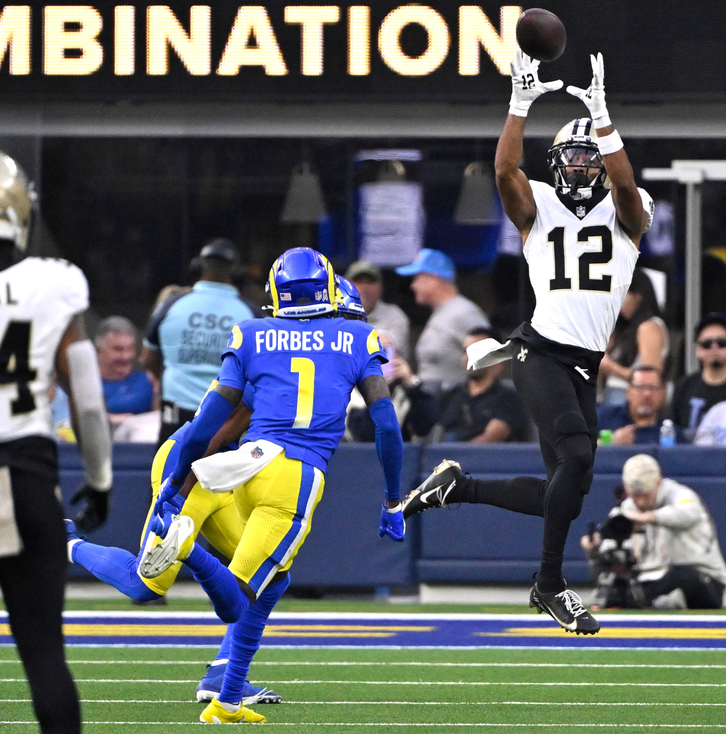 Inglewood, CA - November 02: Wide receiver Chris Olave #12 of the New Orleans Saints catches a pss for a first down over Emmanuel Forbes Jr. #1 of the Los Angeles Rams in the second half of a NFL football game at SoFi Stadium in Inglewood on Sunday, November 2, 2025. (Photo by Keith Birmingham/MediaNews Group/Pasadena Star-News via Getty Images)