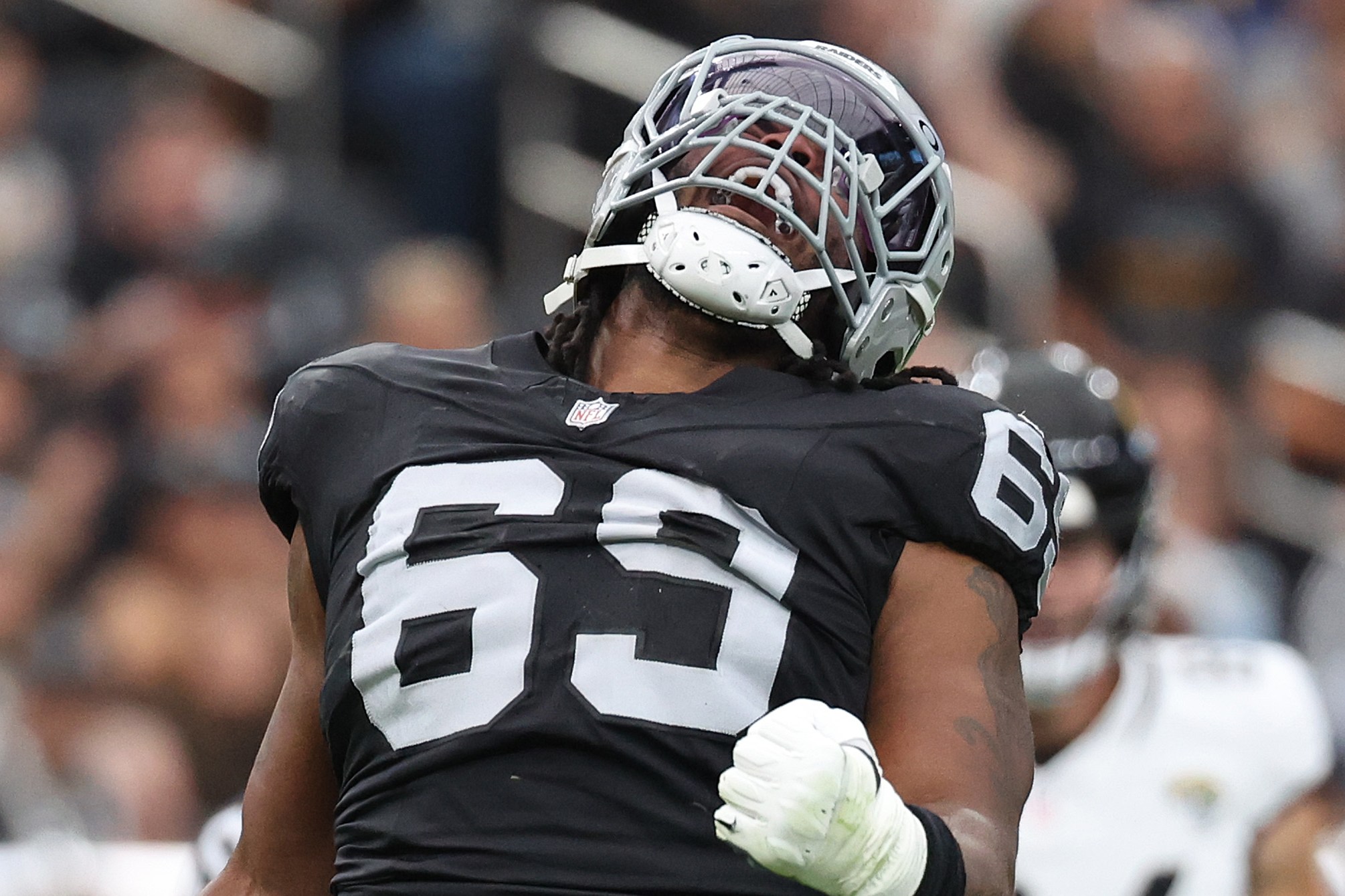 LAS VEGAS, NEVADA - NOVEMBER 02: Adam Butler #69 of the Las Vegas Raiders reacts after making a tackle during the first quarter in the game against the Jacksonville Jaguars at Allegiant Stadium on November 02, 2025 in Las Vegas, Nevada. (Photo by Ian Maule/Getty Images)