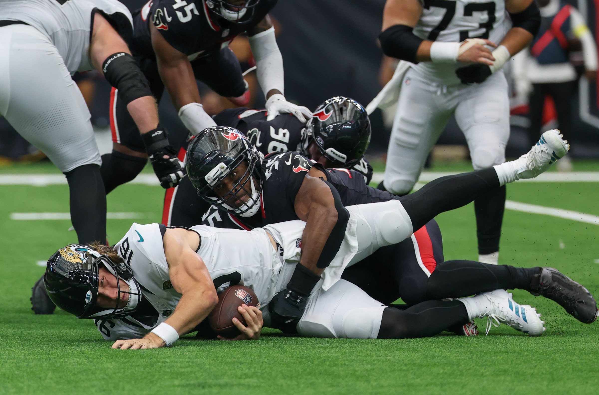 HOUSTON, TX - NOVEMBER 09: Defensive end Danielle Hunter #55 of the Houston Texans sacks quarterback Trevor Lawrence #16 of the Jacksonville Jaguars during the NFL football game between Houston Texans and Jacksonville Jaguars on November 9, 2025, at NRG Stadium in Houston, TX. (Photo by David Buono/Icon Sportswire via Getty Images)