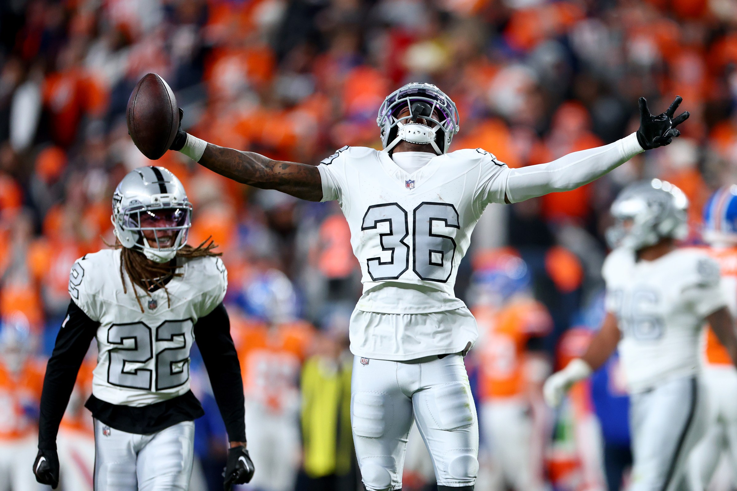 DENVER, COLORADO - NOVEMBER 06: Kyu Blu Kelly #36 of the Las Vegas Raiders celebrates after intercepting a pass thrown by Bo Nix #10 of the Denver Broncos during the second quarter in the game at Empower Field At Mile High on November 06, 2025 in Denver, Colorado. (Photo by Jamie Schwaberow/Getty Images)