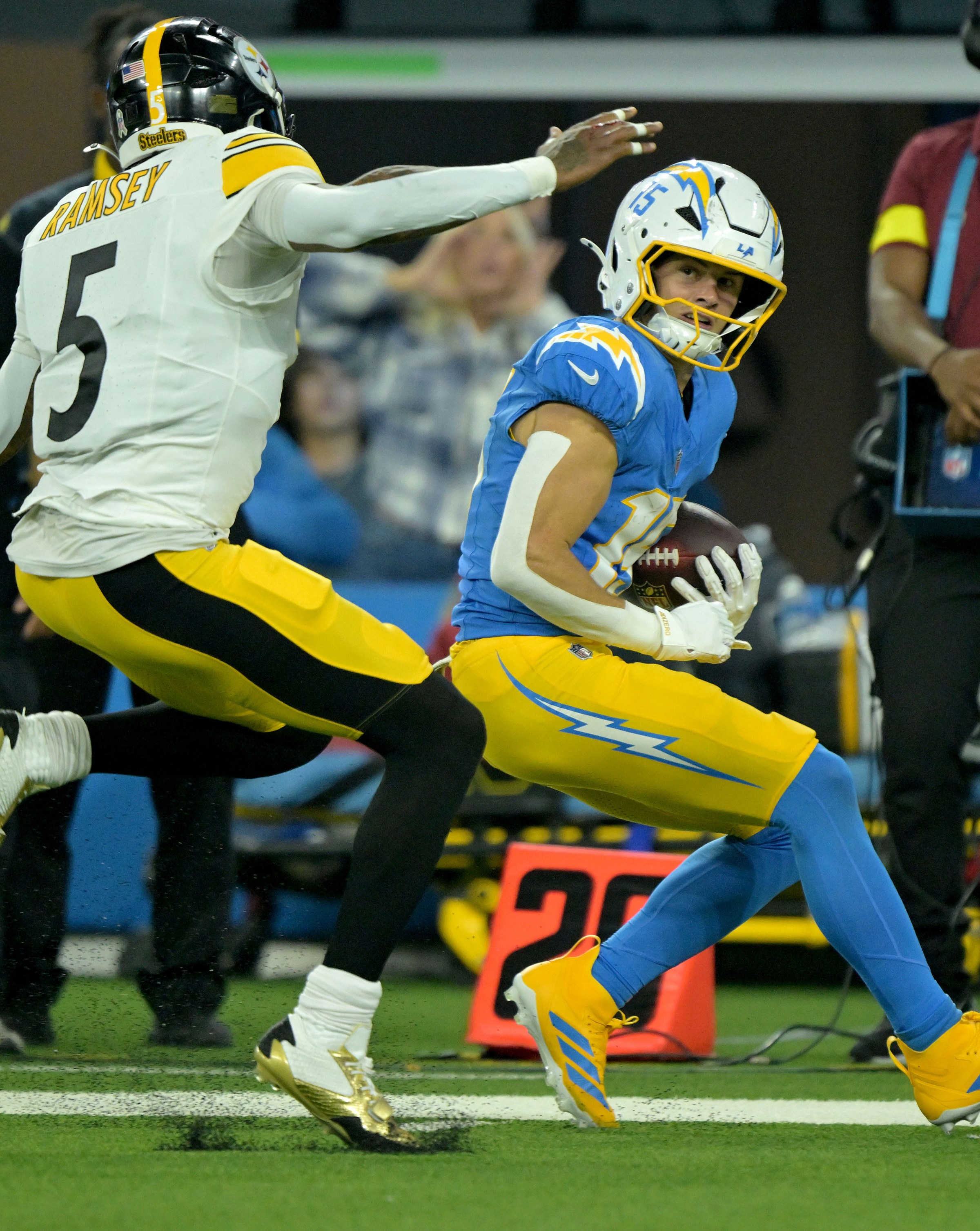 Inglewood, CA - November 09: Chargers wide receiver Ladd McConkey runs down field after a reception for a large gain as Ptitsburgh cornerback Jalen Ramsey defends during the second half at SoFi Stadium in Inglewood on Sunday, Nov. 9, 2025. The Los Angeles Chargers defeated the Pittsburgh Steelers 25-10 in a National Football League (NFL) regular season game. (Photo by Will Lester/MediaNews Group/Inland Valley Daily Bulletin via Getty Images)