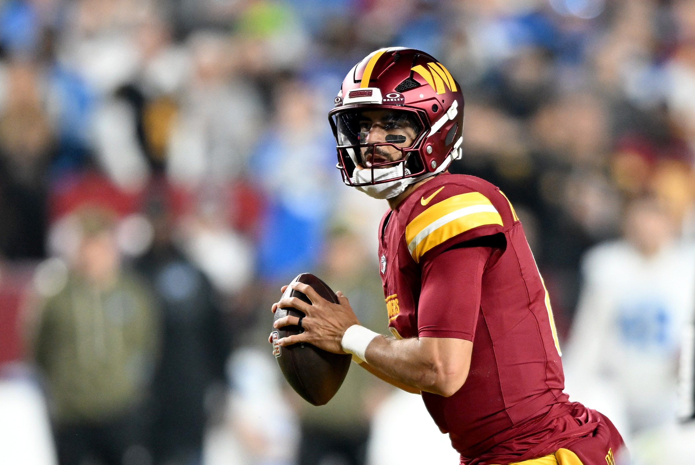 LANDOVER, MARYLAND - NOVEMBER 09: Marcus Mariota #8 of the Washington Commanders drops back to pass against the Detroit Lions at Northwest Stadium on November 09, 2025 in Landover, Maryland. (Photo by G Fiume/Getty Images)