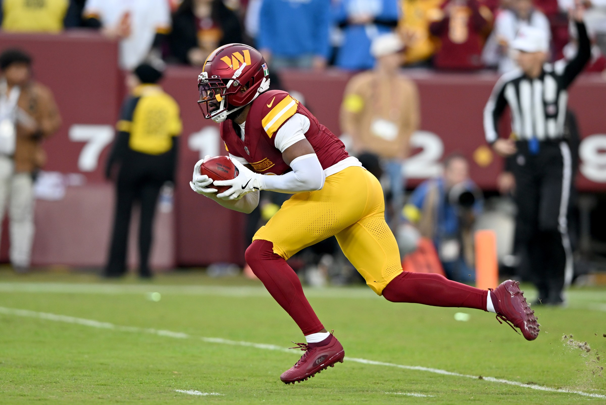 LANDOVER, MARYLAND - NOVEMBER 09: Noah Igbinoghene #6 of the Washington Commanders returns a kick against the Detroit Lions at Northwest Stadium on November 09, 2025 in Landover, Maryland. (Photo by G Fiume/Getty Images)
