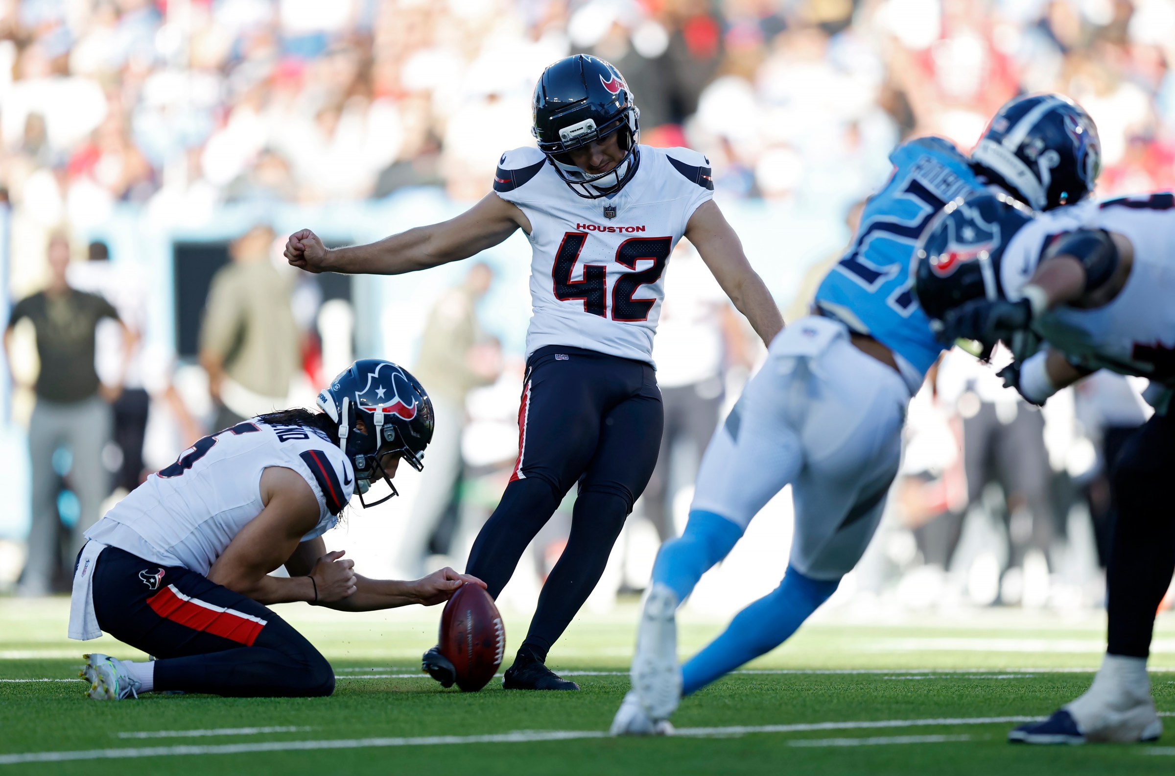 NASHVILLE, TENNESSEE - NOVEMBER 16: Matthew Wright #42 of the Houston Texans kicks a field goal during the second half against the Tennessee Titans at Nissan Stadium on November 16, 2025 in Nashville, Tennessee. (Photo by Justin Ford/Getty Images)
