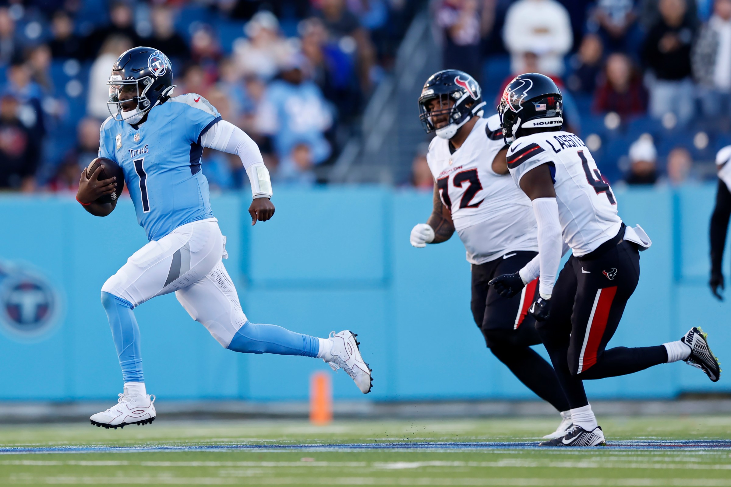 NASHVILLE, TENNESSEE - NOVEMBER 16: Cam Ward #1 of the Tennessee Titans runs the ball during the second half against the Houston Texans at Nissan Stadium on November 16, 2025 in Nashville, Tennessee. (Photo by Justin Ford/Getty Images)