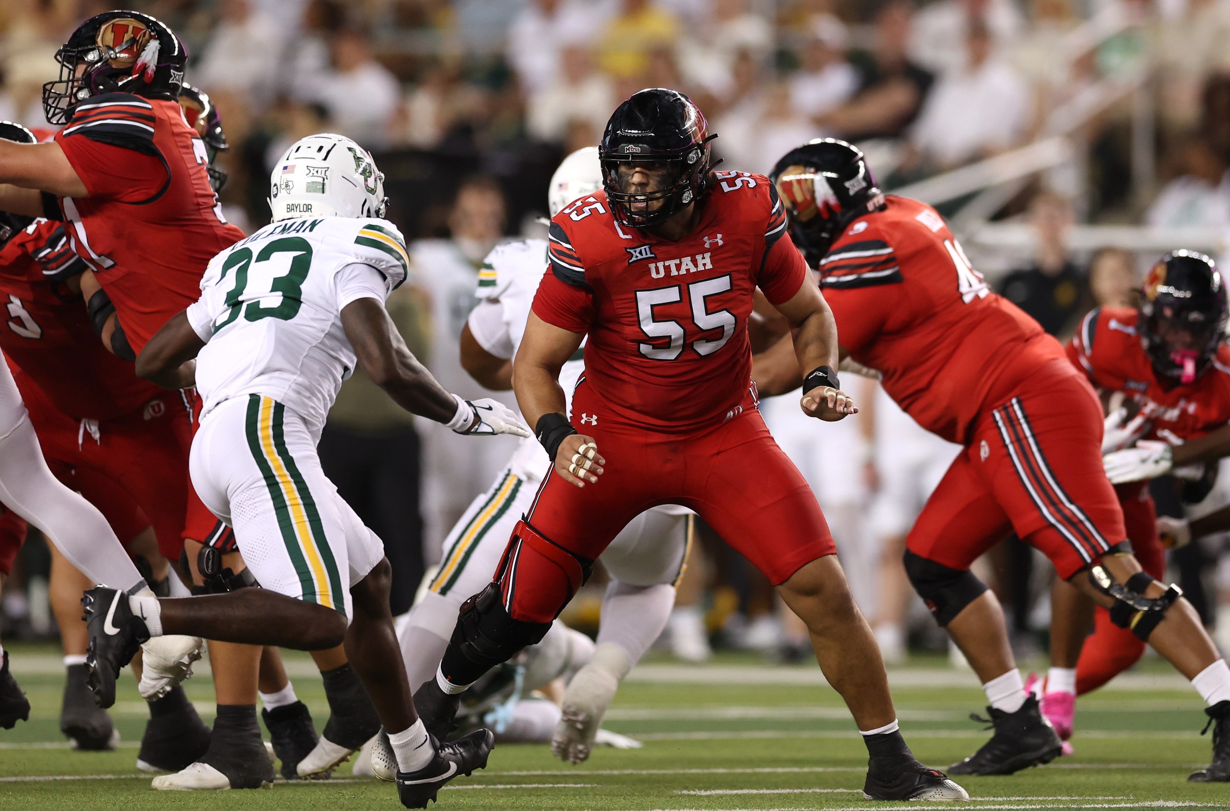 WACO, TEXAS - NOVEMBER 15: Spencer Fano #55 of the Utah Utes blocks during the first half against the Baylor Bears at McLane Stadium on November 15, 2025 in Waco, Texas. (Photo by Sam Hodde/Getty Images)