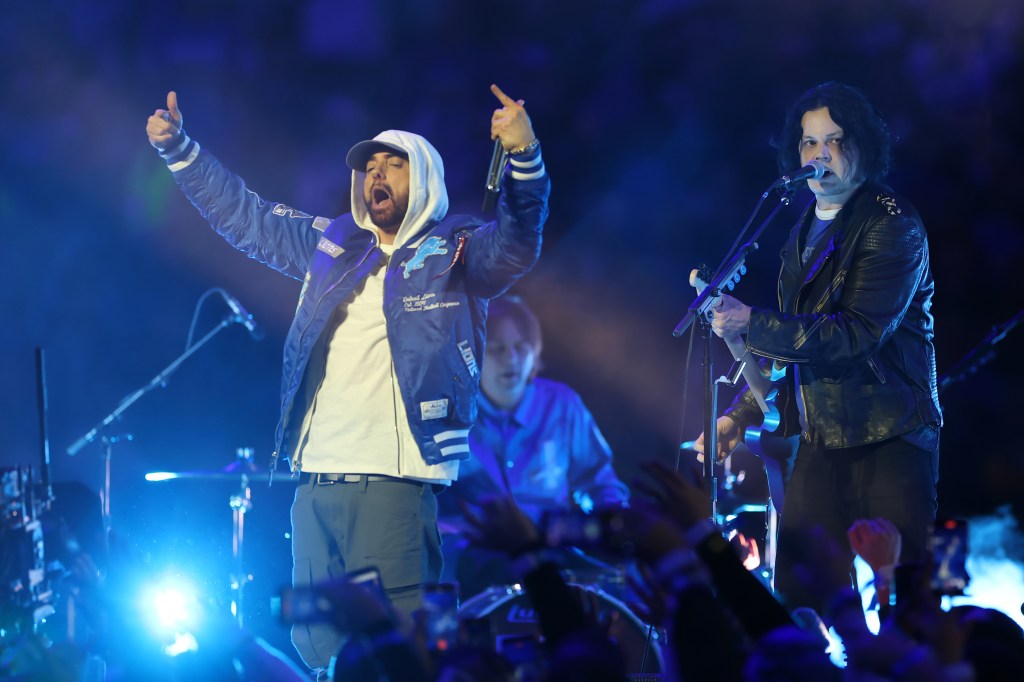 Eminem and Jack White perform at the Green Bay Packers v Detroit Lions halftime show.