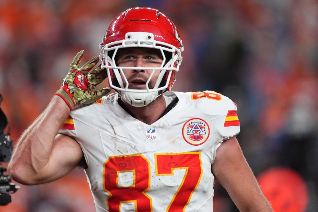 Travis Kelce of the Kansas City Chiefs celebrates a score against the Denver Broncos.