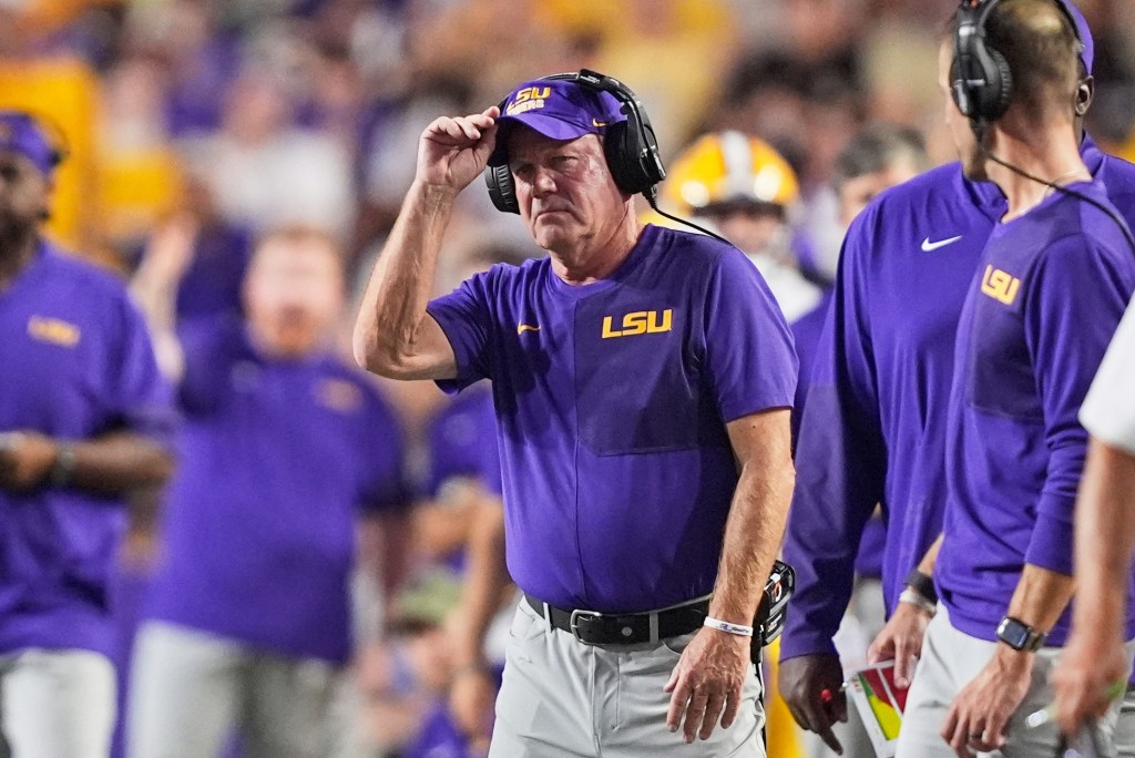 LSU head coach Brian Kelly watches the game from the sideline.