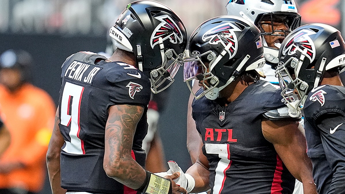 Michael Penix Jr. and Bijan Robinson