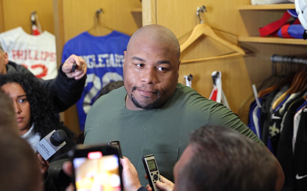 New York Giants defensive tackle Dexter Lawrence II #97, speaking to the media in front of his locker after practice at the New York Giants training facility in East Rutherford, New Jersey.