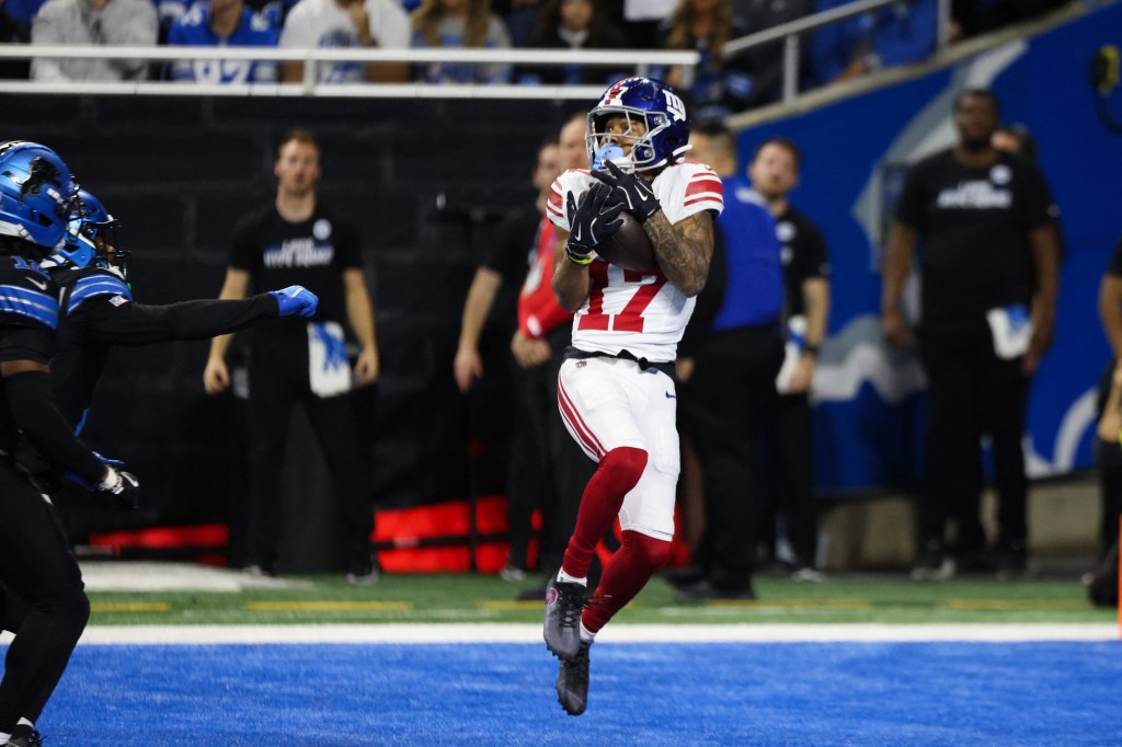 New York Giants wide receiver Wan'Dale Robinson (17) catches a pass for a touchdown against the Detroit Lions.