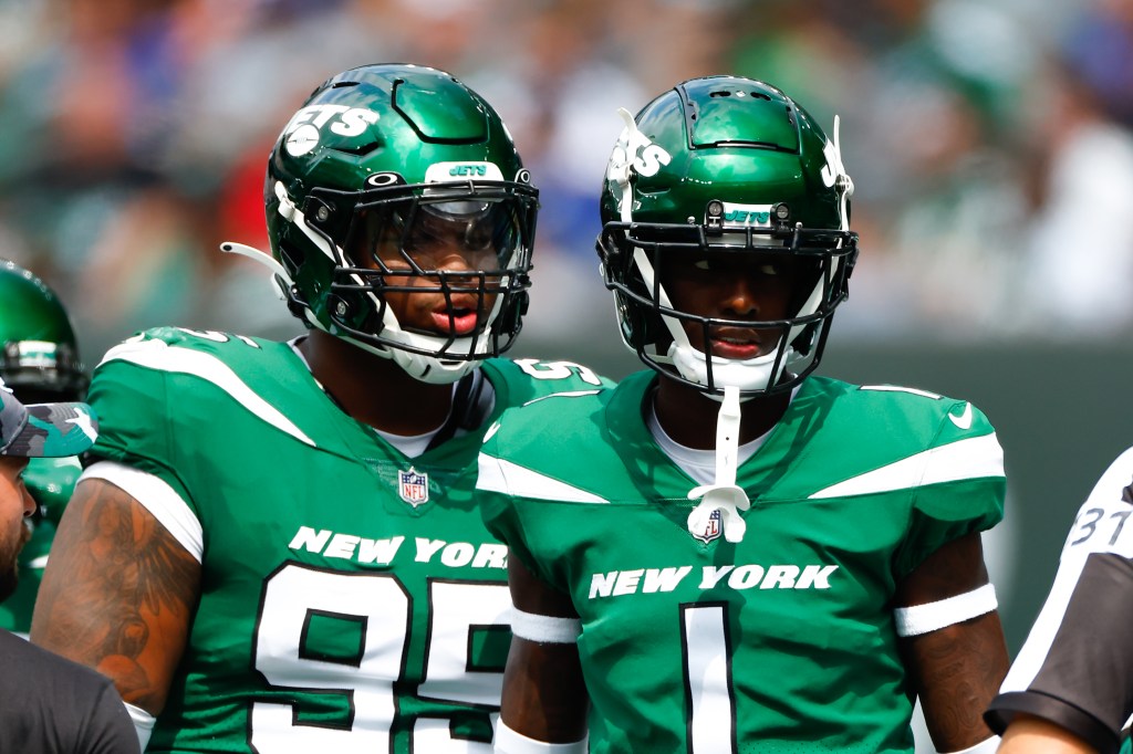 New York Jets defensive lineman Quinnen Williams (95) and New York Jets cornerback Sauce Gardner (1) during the first quarter of the National Football League game between the New York Jets and the New York Giants on August 28, 2022 at MetLife Stadium in East Rutherford, New Jersey.
