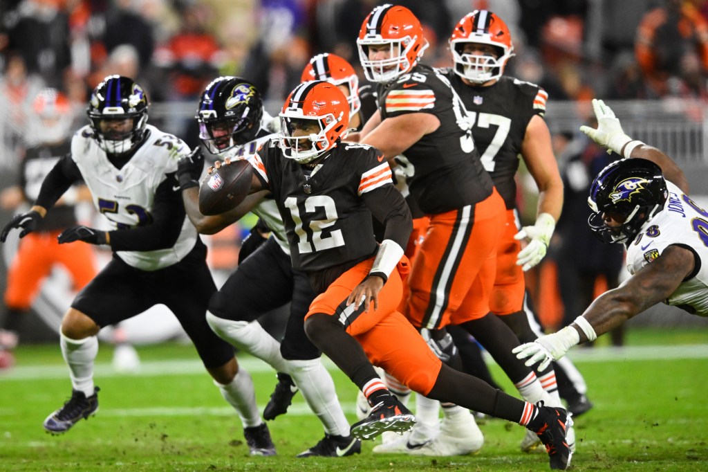 Browns quarterback Shedeur Sanders (12) runs the ball against the Ravens on Nov. 16, 2025.