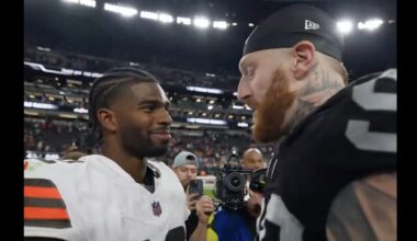 Shedeur Sanders and Maxx Crosby talking after a Browns-Raiders game