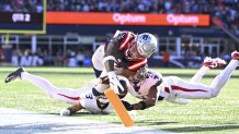 Nov 2, 2025; Foxborough, Massachusetts, USA;  New England Patriots wide receiver Stefon Diggs (8) runs for a touchdown against Atlanta Falcons safety Jessie Bates III (3) and cornerback Mike Hughes (21) during the first half at Gillette Stadium. Mandatory Credit: Eric Canha-Imagn Images