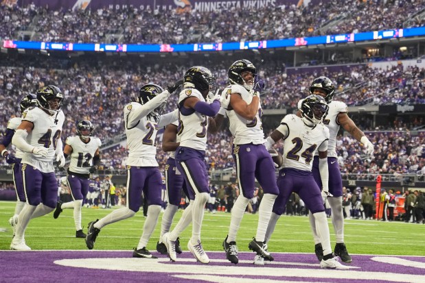 Baltimore Ravens safety Malaki Starks (24) celebrates his interception against the Minnesota Vikings in the first half of an NFL football game, Sunday, Nov. 9, 2025, in Minneapolis. (AP Photo/Abbie Parr)