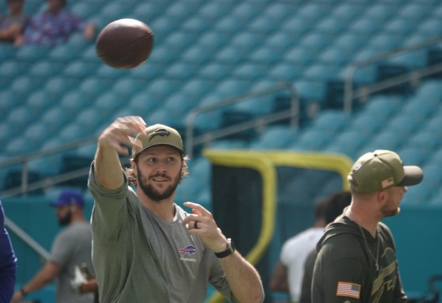 Buffalo Bills quarterback Josh Allen warms up before the game...