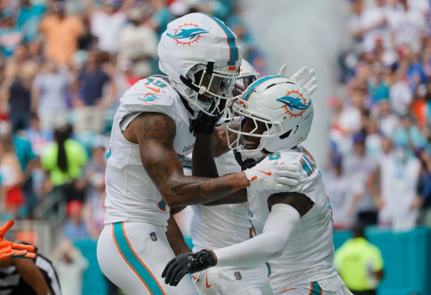 Miami Dolphins wide receiver Nick Westbrook-Ikhine and wide receiver Malik...