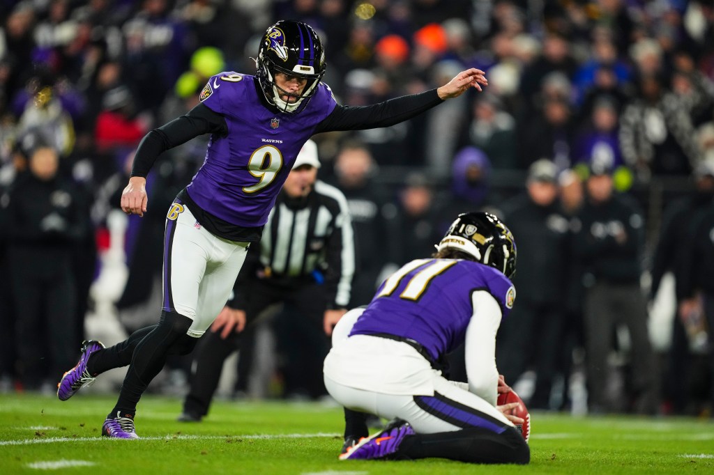 Justin Tucker #9 of the Baltimore Ravens kicks for a field goal during an NFL football wild card playoff game against the Pittsburgh Steelers at M&T Bank Stadium on January 11, 2025 in Baltimore, Maryland.