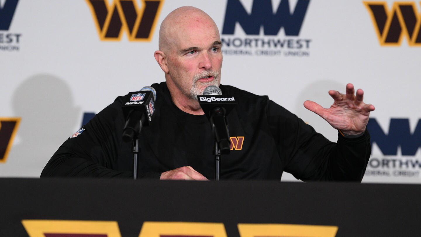 Quinn takes over Whitt's defensive duties with Commanders at 3-7