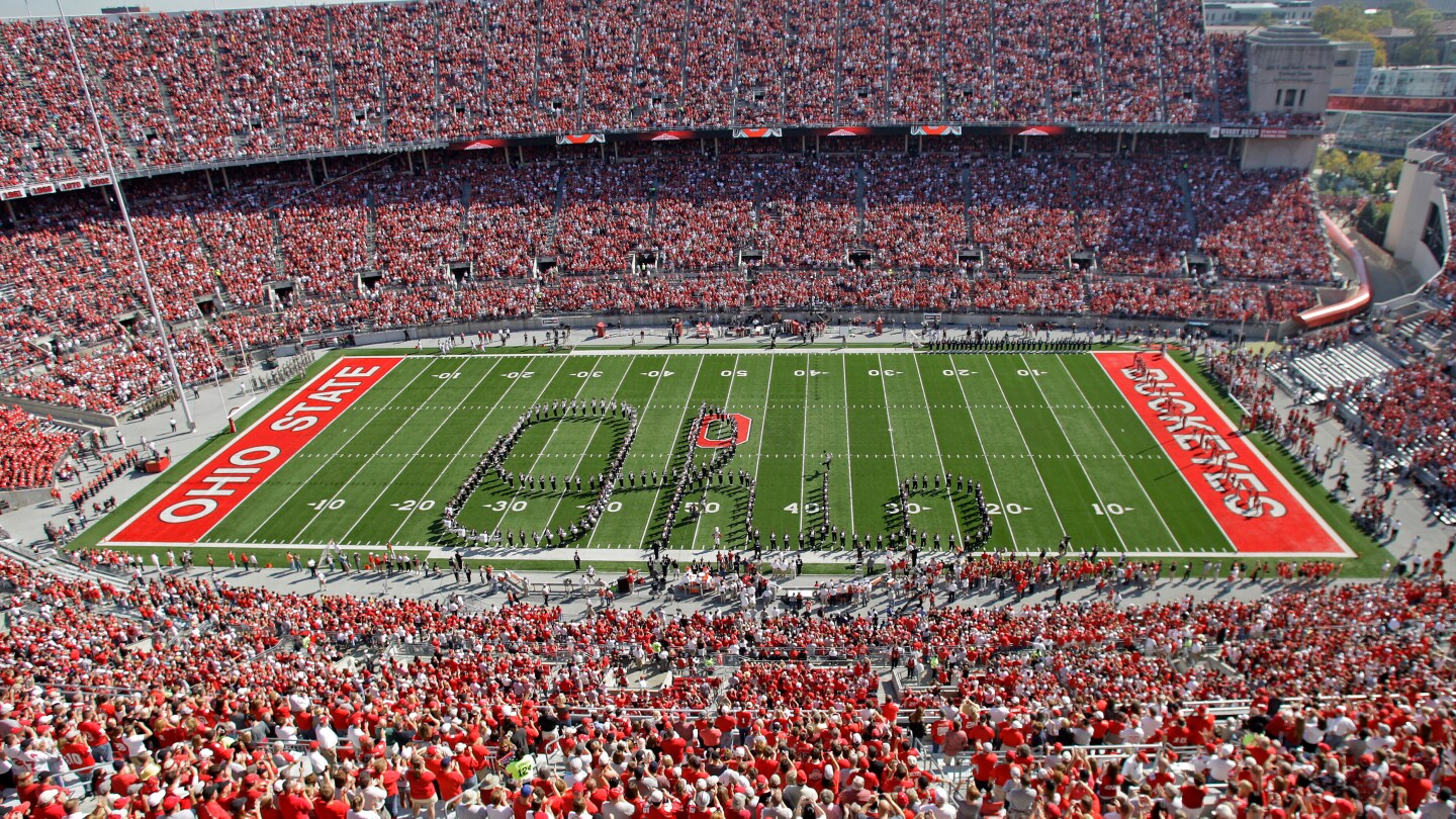 Tradition of Script Ohio and dotting the i defines Ohio State
