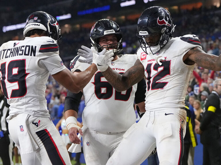 Texans corral high-scoring Colts, narrow AFC South race