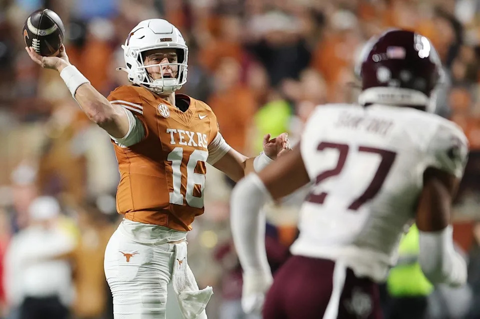 Arch Manning #16 of the Texas Longhorns throws a pass against the Texas A&M Aggies. Getty Images
