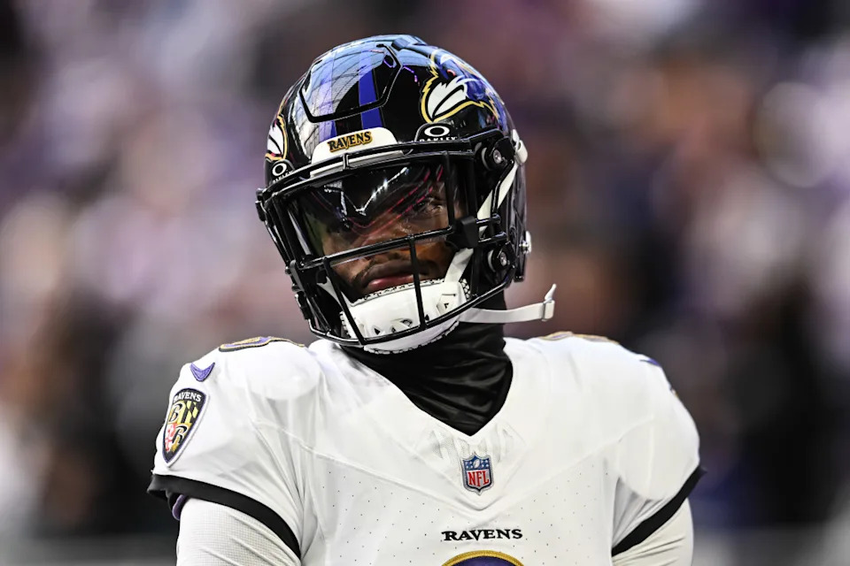 Baltimore Ravens quarterback Lamar Jackson (8) looks on before the game against the Minnesota Vikings at U.S. Bank Stadium.© Jeffrey Becker-Imagn Images