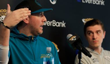 Jacksonville Jaguars head coach Liam Coen, left, speaks during a press conference next to general manager James Gladstone at Miller Electric Center Tuesday, April 15, 2025 in Jacksonville, Fla.