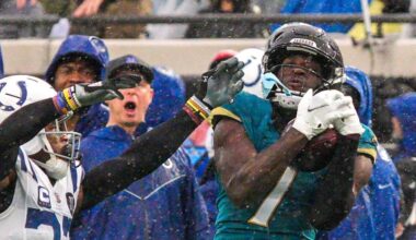 Jacksonville Jaguars wide receiver Brian Thomas Jr. (7) hauls in a pass as Indianapolis Colts cornerback Kenny Moore II (23) pressures him in the third quarter during an NFL football game at EverBank Stadium, Sunday, Dec. 7, 2025, in Jacksonville, Fla.