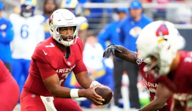 Arizona Cardinals quarterback Jacoby Brissett (7) hands off the ball against the Los Angeles Rams in the first half at State Farm Stadium on Dec 7, 2025, in Glendale, Ariz.