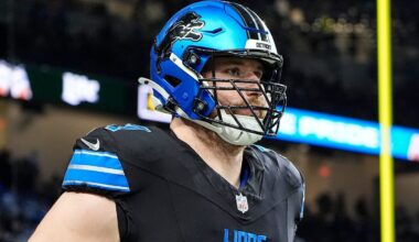 Detroit Lions center Frank Ragnow (77) warms up before the game between the Detroit Lions and Buffalo Bills at Ford Field in Detroit on Sunday, Dec. 15, 2024.