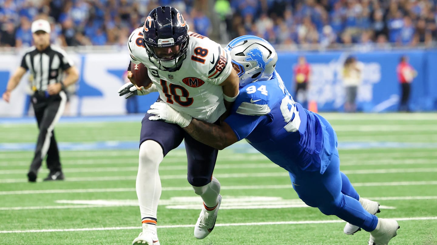 Sep 14, 2025; Detroit, Michigan, USA; Detroit Lions defensive tackle Mekhi Wingo (94) tackles Chicago Bears quarterback Caleb Williams (18) during the second quarter of the game at Ford Field. Mandatory Credit: David Reginek-Imagn Images