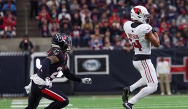 Dec 14, 2025; Houston, Texas, USA; Arizona Cardinals wide receiver Michael Wilson (14) catches a pass against Houston Texans cornerback Derek Stingley Jr. (24) in the third quarter at NRG Stadium. Mandatory Credit: Thomas Shea-Imagn Images