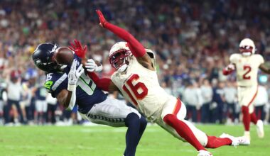 Sep 25, 2025; Glendale, Arizona, USA;  Seattle Seahawks wide receiver Tory Horton (15) cannot make a catch against Arizona Cardinals cornerback Max Melton (16) in the second quarter at State Farm Stadium. Mandatory Credit: Mark J. Rebilas-Imagn Images