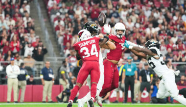 Nov 23, 2025; Glendale, Arizona, USA; Arizona Cardinals safety Jalen Thompson (34) forces a fumble from Jacksonville Jaguars quarterback Trevor Lawrence (16) during the first quarter at State Farm Stadium. Mandatory Credit: Joe Camporeale-Imagn Images