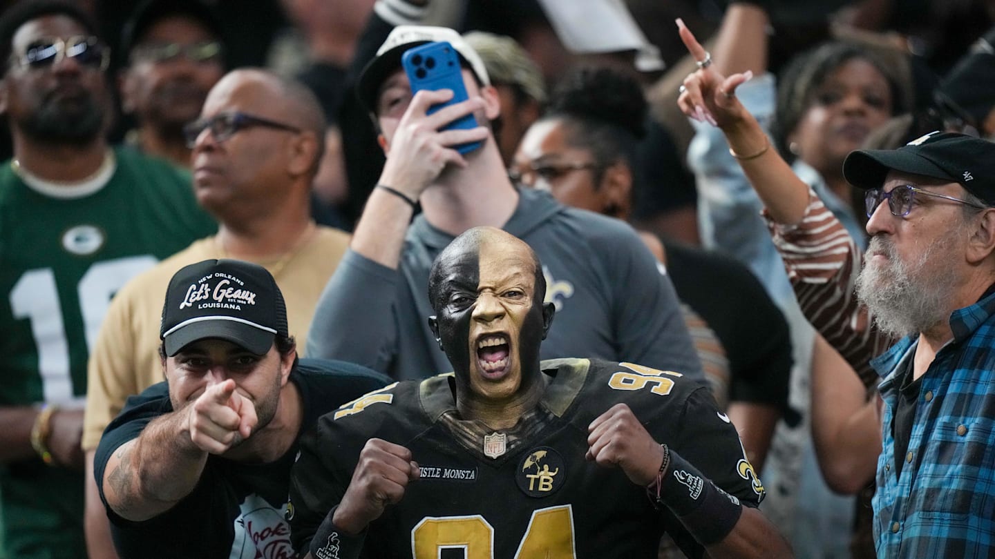 New Orleans Saints fans show their pride during the first half of a game