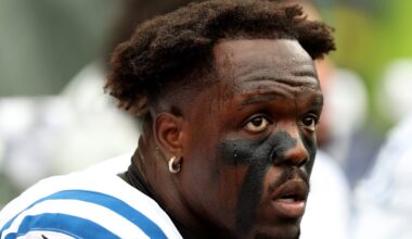 Kwity Paye of the Indianapolis Colts looks on