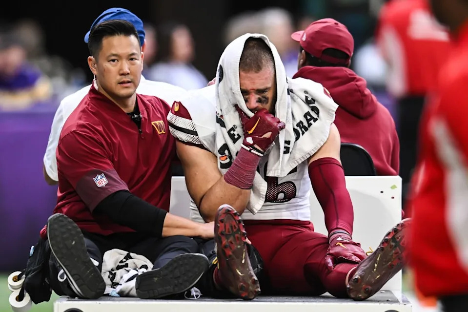 Washington Commanders tight end Zach Ertz (86) is carted off the field after an injury during the second half against the Vikinings at U.S. Bank Stadium in Minnesota on December 7, 2025. Jeffrey Becker-Imagn Images