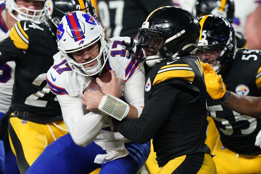 Buffalo Bills quarterback Josh Allen scores a touchdown in the second half against the Pittsburgh Steelers.