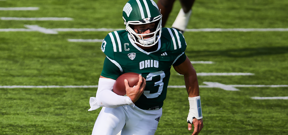 Ohio Football quarterback Parker Navarro rushing the ball against Gardner-Webb.