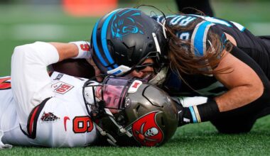 Tampa Bay Buccaneers quarterback Baker Mayfield is sacked by Carolina Panthers linebacker Christian Rozeboom during the first half of an NFL football game, Sunday, Dec. 21, 2025, in Charlotte, N.C. (AP Photo/Erik Verduzco)