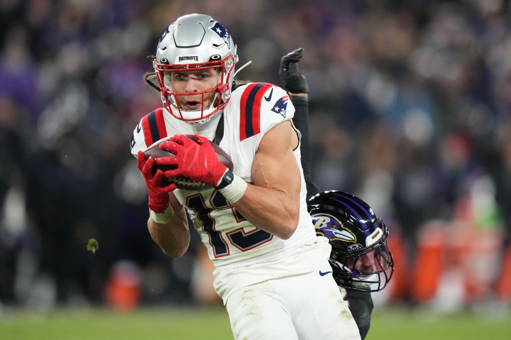 New England Patriots wide receiver Mack Hollins (13) running with the ball against the Baltimore Ravens.