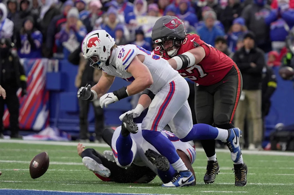 Buffalo Bills defensive end Joey Bosa tuns towards the fumble that Buffalo Bills defensive tackle DaQuan Jones caused after sacking Tampa Bay Buccaneers quarterback Baker Mayfield during second half action against the Tampa Bay Buccaneers on Nov 16, 2025 at Highmark Stadium in Orchard Park. The Bills recovered theh fumble.