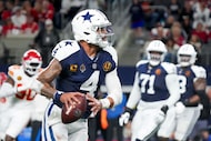 Dallas Cowboys quarterback Dak Prescott (4) looks to pass during the second half of an NFL...