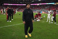 Arizona Cardinals quarterback Kyler Murray leaves the field after an NFL football game...