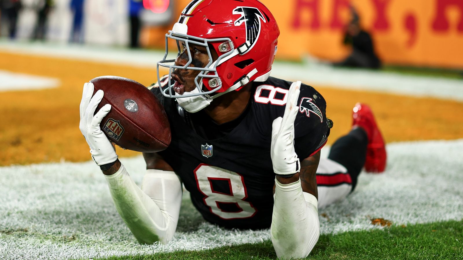 Atlanta Falcons tight end Kyle Pitts celebrates after scoring one of his three touchdowns against the Tampa Bay Buccaneers