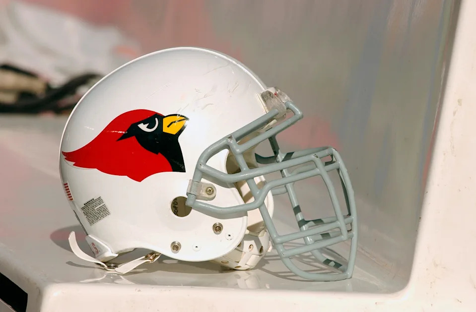 The helmet of the Arizona Cardinals sits on their team bench during the game against the Chicago Bears on November 30, 2003 at Soldier Field in Chicago, Illinois.